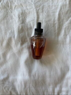 Bath & Body Works amber glass dropper bottle with black cap